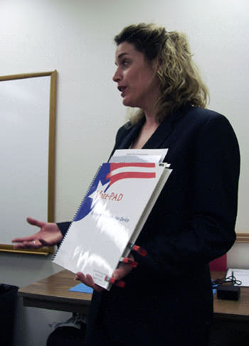 VotePAD representative Dianna Smith shows off her company's system